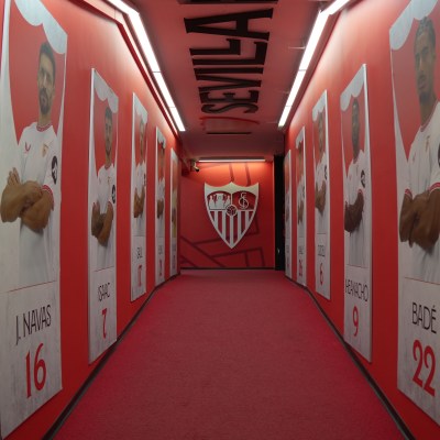 a train with graffiti on the side of a building